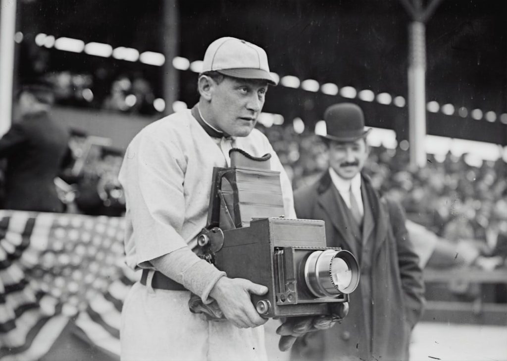 [Germany Schaefer, Washington AL (baseball)]. Glass negative from George Grantham Bain Collection, [1911]. Library of Congress Prints & Photographs Division. Photograph shows Schaefer, one of the most entertaining characters in baseball history, trying out the other side of the camera during the Washington Senators visit to play the New York Highlanders in April, 1911. https://www.loc.gov/item/2014689117/